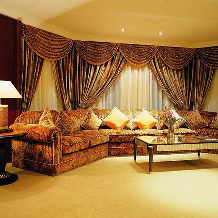 Grand Regency Doha, Trademark Collection By Wyndham Zewnętrze zdjęcie A living room